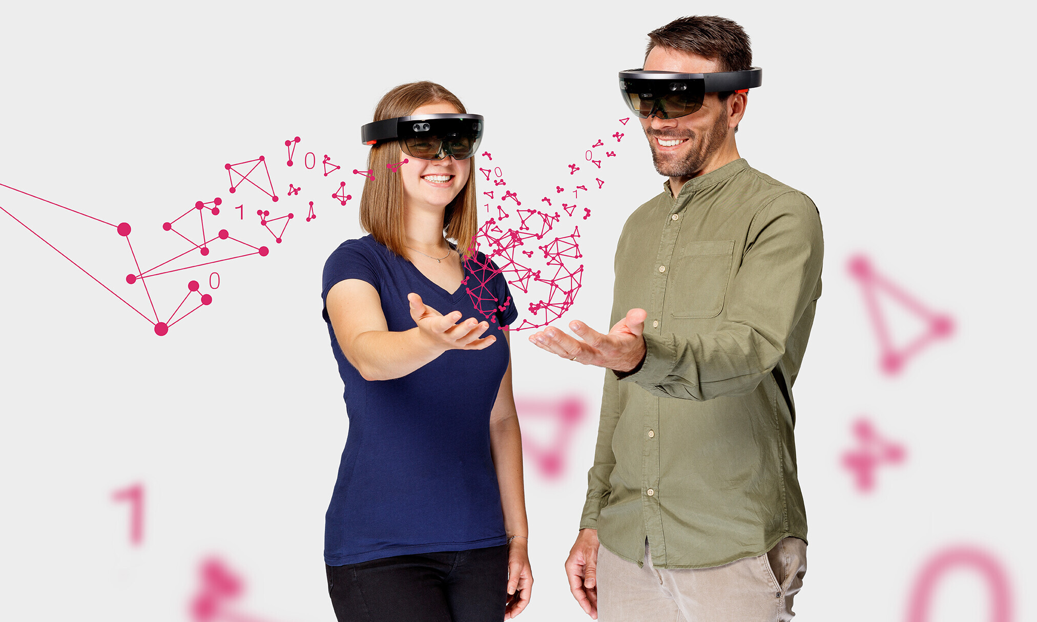 Eine Frau und ein Mann mit VR-Brillen, die fröhlich sind: Das Bild illustriert die positiven Seiten der künstlichen Intelligenz.