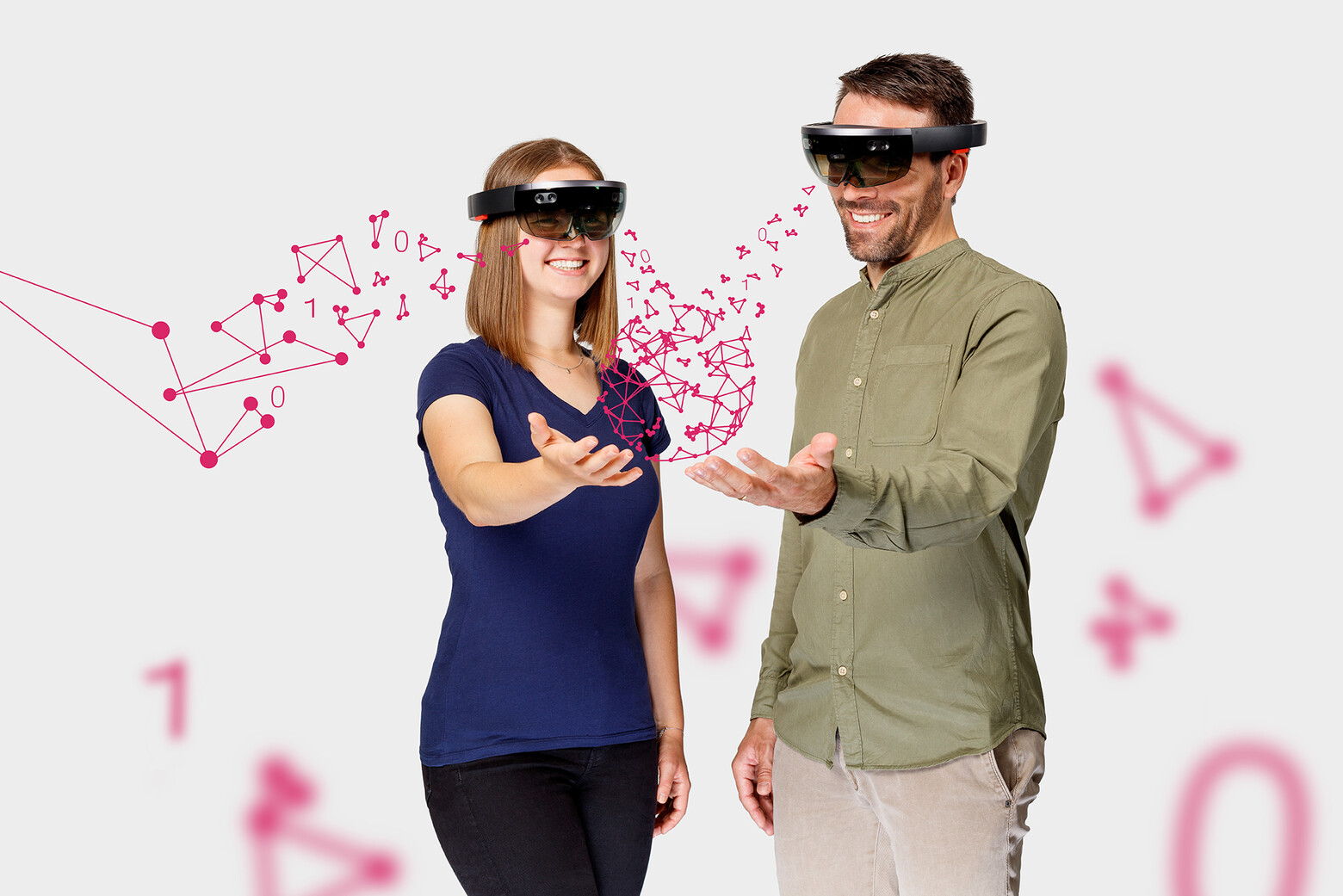 Eine Frau und ein Mann mit VR-Brillen, die fröhlich sind: Das Bild illustriert die positiven Seiten der künstlichen Intelligenz.